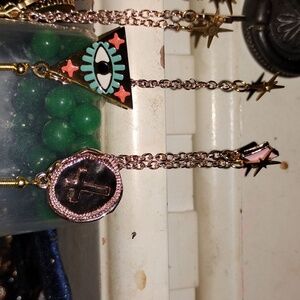 Magicka/Cross Dangle Earrings with Star And Eye Design